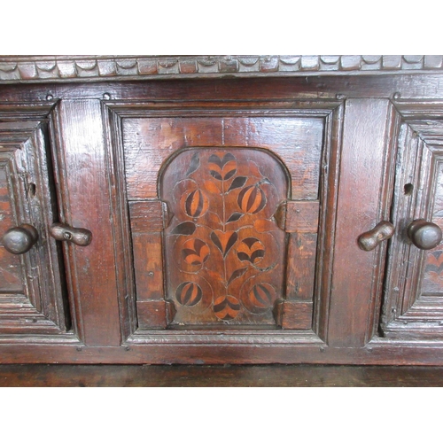 528 - A primarily 17th Century oak Deuddarn with carved frieze dated 1563 with serpent decoration above a ... 