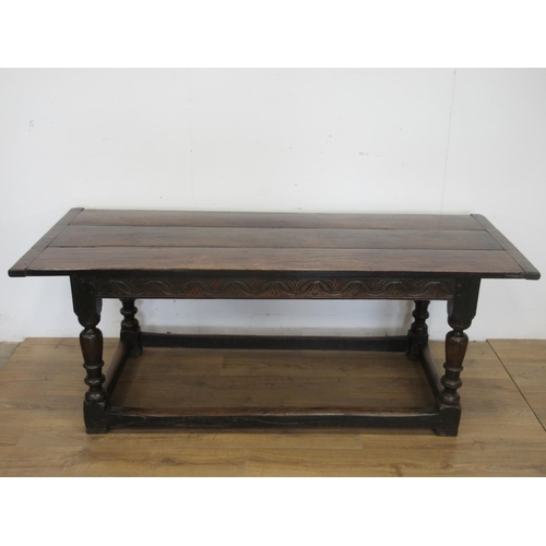 529 - A 17th Century oak Refectory Table with three plank cleated top above interlocking lunette and chann... 