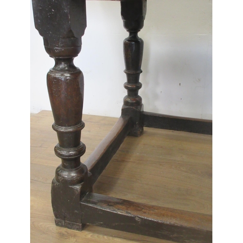 529 - A 17th Century oak Refectory Table with three plank cleated top above interlocking lunette and chann... 