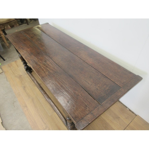 529 - A 17th Century oak Refectory Table with three plank cleated top above interlocking lunette and chann... 