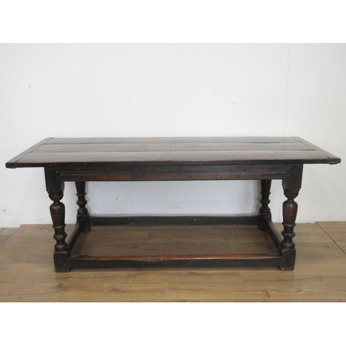 529 - A 17th Century oak Refectory Table with three plank cleated top above interlocking lunette and chann... 