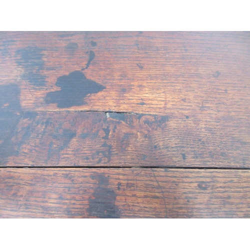 533 - An 18th Century oak Lowboy fitted three drawers above carved and pierced frieze on four cabriole leg... 