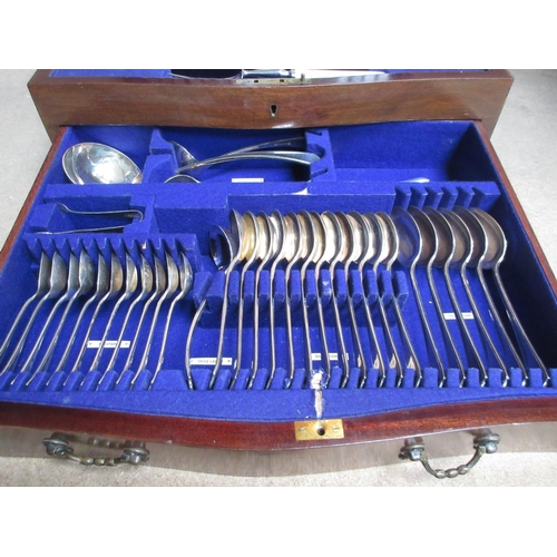 60 - A Canteen of Cutlery for twelve with dog nose finials, includes Table and Dessert Forks and Knives, ... 