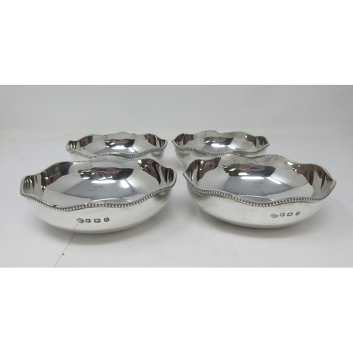 7 - Four George V silver oval Dishes with shaped beaded rims, Sheffield 1926, 442gms