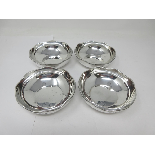 8 - Four George V silver circular Bowls with shaped beaded rims, Sheffield 1925, 522gms