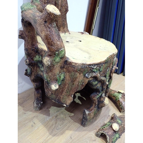 433 - A majolica Rustic Garden Chair, treacle glazed, with rustic branch back and arms, believed to be by ... 