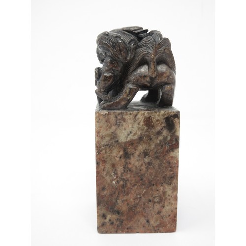 360 - A marble Carving of a kylin and young playing, on a variegated marble squared column, 4 1/2in H