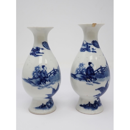 319 - A pair of 19th Century Chinese blue and white Vases of baluster form, decorated figures in a landsca... 