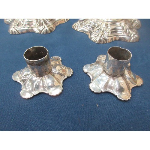 372 - A pair of mid 18th Century silver-form Paktong Candlesticks with knopped stems and petal bases, 9in ... 