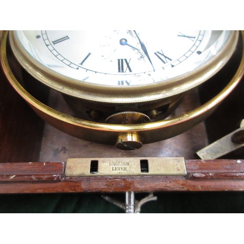 392 - A brass marine Chronometer by Thomas Mercer, St Albans, with silvered dial with Roman numerals and t... 