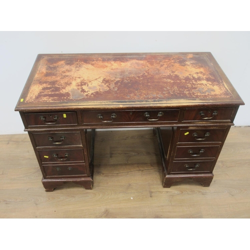 27 - A mahogany veneered pedestal Desk on bracket feet 4ft W x 2ft 8in H