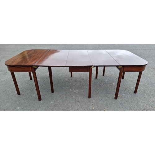 113 - A 19th Century mahogany Dining Table having pair of D-ends, central section with one dropleaf, one s... 