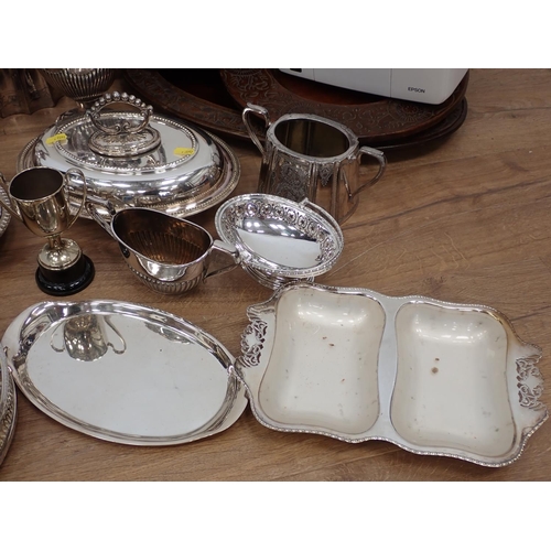 568 - A stoneware red glazed Coffee Set, five Bowls and a leaf shaped Dish