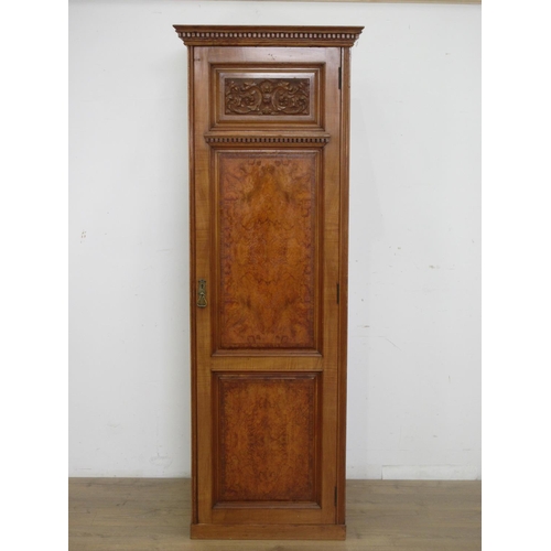 10 - A walnut Cupboard, the single door with carved panel above above two burr walnut panels, 6ft 5in x 2... 