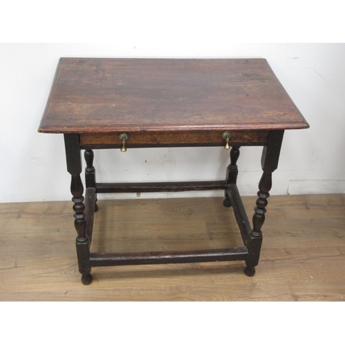 103 - An 18th Century Side Table with moulded fruitwood top fitted single frieze drawer mounted upon turne... 