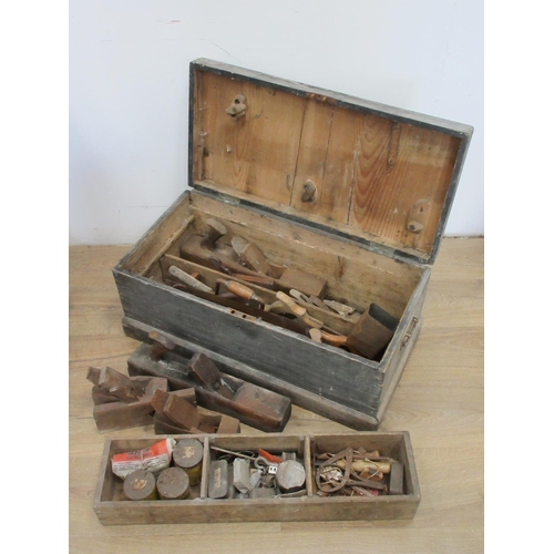 104 - An antique pine Tool Chest containing carpenter's Tools