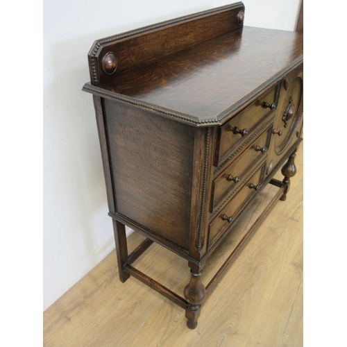 123 - A moulded oak Sideboard fitted three drawers and a cupboard door 3ft 9in W x 3ft 6in H