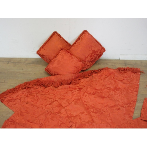 141 - A bag of orange Cushions