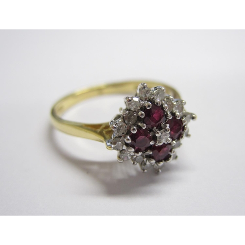 159 - A Diamond and Ruby Cluster Ring peg-set eight-cut diamond within four round rubies and outer frame o... 