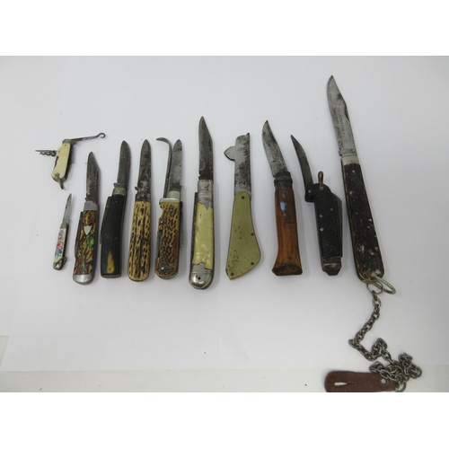 217 - An interesting collection of Folding Knives including brass-cased Bleeding Knives, multi-bladed kniv... 