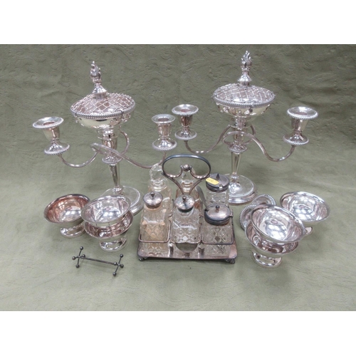 222 - A six bottle Cruet on plated stand, a pair of two-branch Candle Holders with flower holder surmounts... 