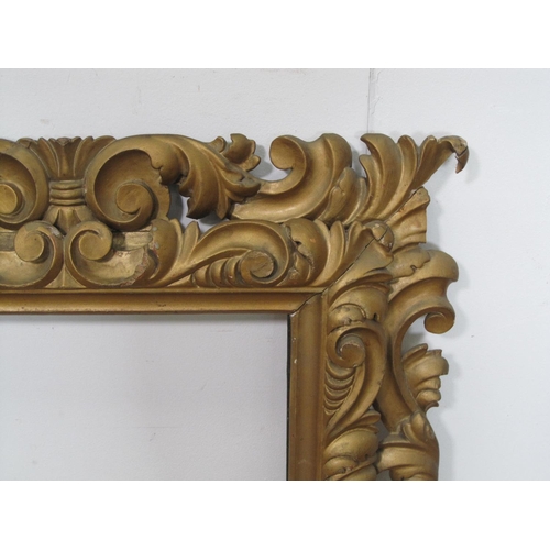 305 - An Italian 19th Century fruit wood carved Frame, in the baroque style, rebate size 24 x 16in