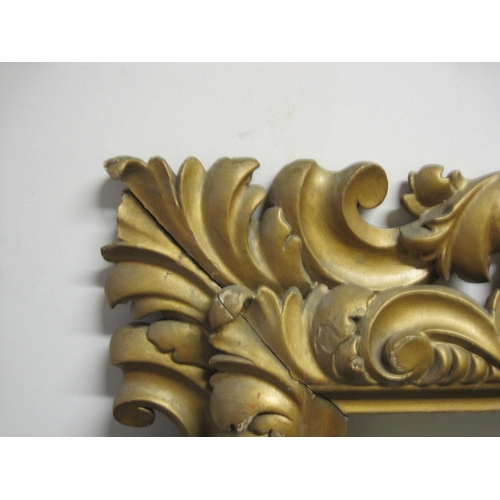 305 - An Italian 19th Century fruit wood carved Frame, in the baroque style, rebate size 24 x 16in