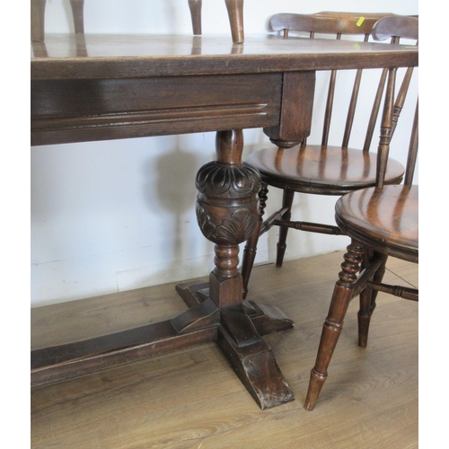 344 - An oak Refectory Table 5ft W x 2ft 6in H, three stick back Chairs and three other Chairs