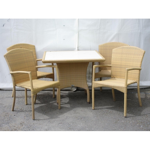 35 - A wicker effect square Garden Table 3ft W x 2ft 5in H and four Chairs