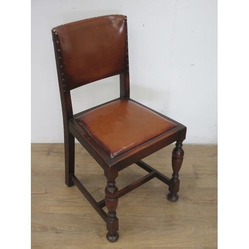 351 - A set of four oak and brown leather Dining Chairs