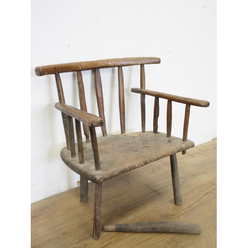 357 - An antique primitive stick back Chair A/F 2ft 3in H