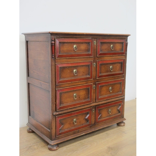 359 - A moulded oak TV Cabinet in the form of a 17th Century Chest on bun feet 3ft H x 2ft 11in W