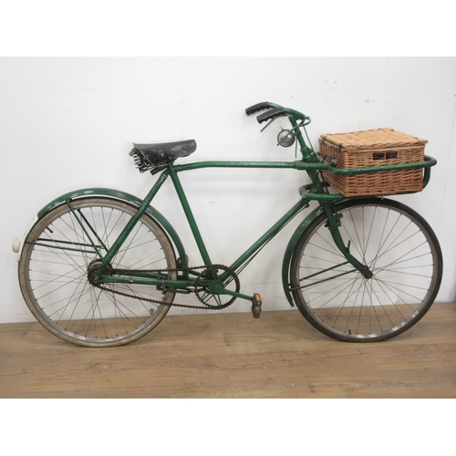 36 - An old green painted grocer's Bicycle with front basket