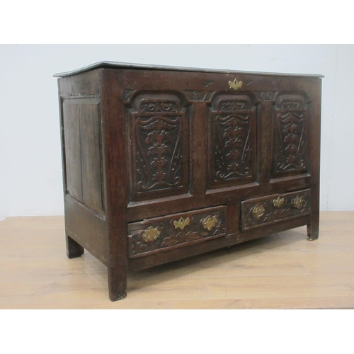 363 - An 18th Century oak Mule Chest with three carved panels above two drawers 4ft W x 2ft 1on H