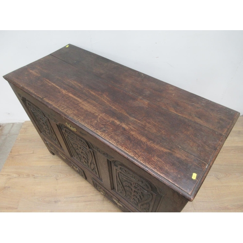 363 - An 18th Century oak Mule Chest with three carved panels above two drawers 4ft W x 2ft 1on H