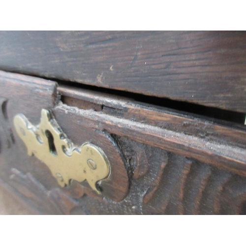 363 - An 18th Century oak Mule Chest with three carved panels above two drawers 4ft W x 2ft 1on H