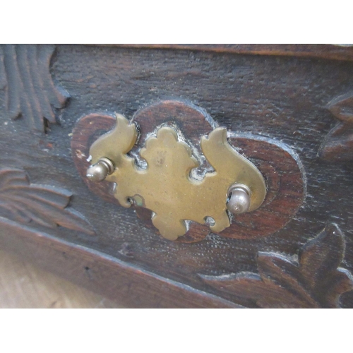 363 - An 18th Century oak Mule Chest with three carved panels above two drawers 4ft W x 2ft 1on H