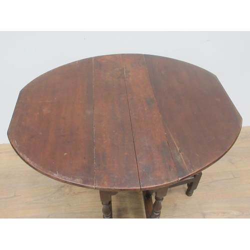 368 - An antique oak gateleg Table fitted end drawer on turned supports A/F 2ft 9in W x 2ft 3in H