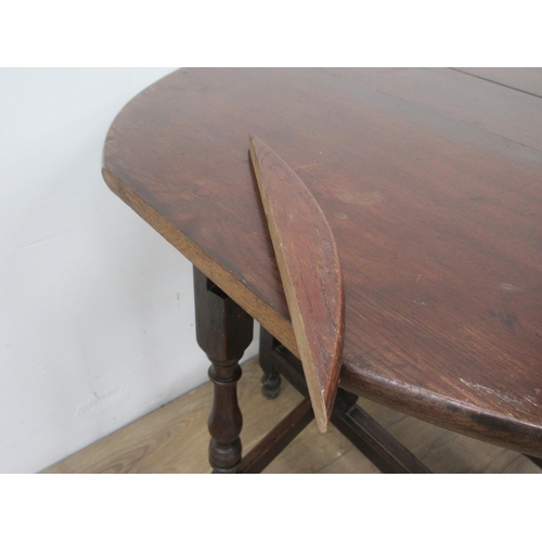 368 - An antique oak gateleg Table fitted end drawer on turned supports A/F 2ft 9in W x 2ft 3in H