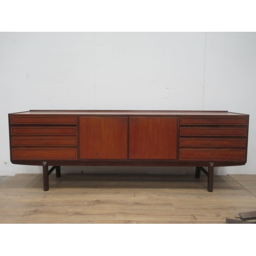 383 - A teak Sideboard fitted eight drawers and two cupboard doors 7ft 3in W x 2ft 5in H