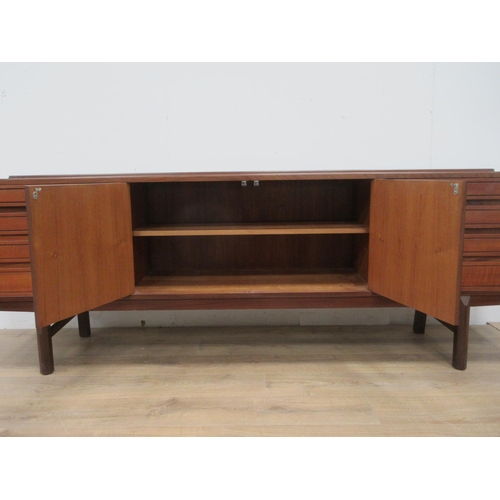 383 - A teak Sideboard fitted eight drawers and two cupboard doors 7ft 3in W x 2ft 5in H