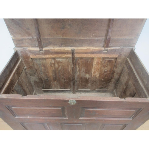 393 - An 18th Century panelled oak Grain Bin/Coffer with three plank lid and exposed joints 4ft W x 2ft 11... 