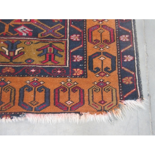 402 - A woollen red ground Rug with styilised floral decoration and brown border 7ft Lx 3ft 6in W approx