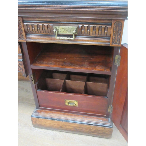 416 - An Aesthetic movement pedestal Sideboard fitted four frieze drawers and two cupboard doors on plinth... 