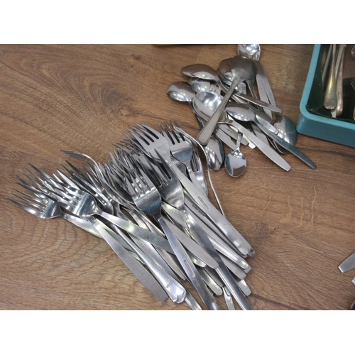 423 - A box of stainless Cutlery and Irish silver Tea Spoons, etc