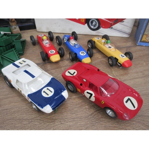 441 - A box of Scalextric including five Cars and a quantity of track