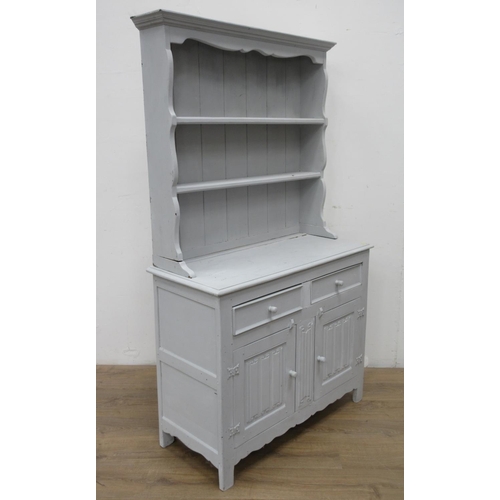 454 - A blue painted linenfold Dresser and Rack fitted two drawers and two cupboard doors 6ft 1in H x 3ft ... 