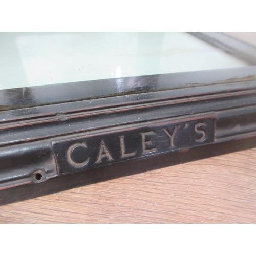 464 - A Caley's ebonised and glazed Display Cabinet with shelves 2ft 4in H x 1ft 4in W