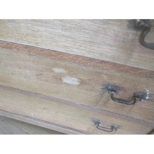 466 - A Heals style oak Chest of two short and three long drawers with chamfered corners 3ft W x 3ft H and... 