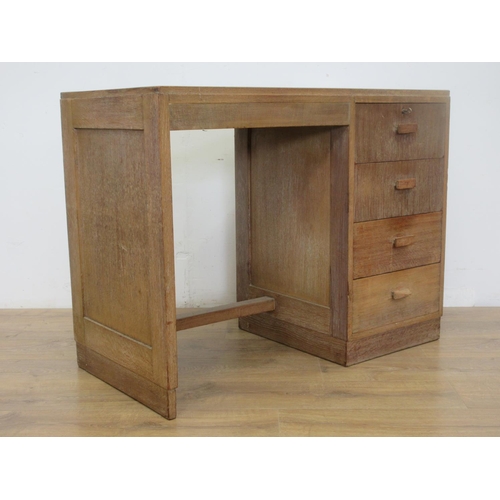 468 - A Heals oak Desk fitted four drawers 3ft 4in W x 2ft 6in H